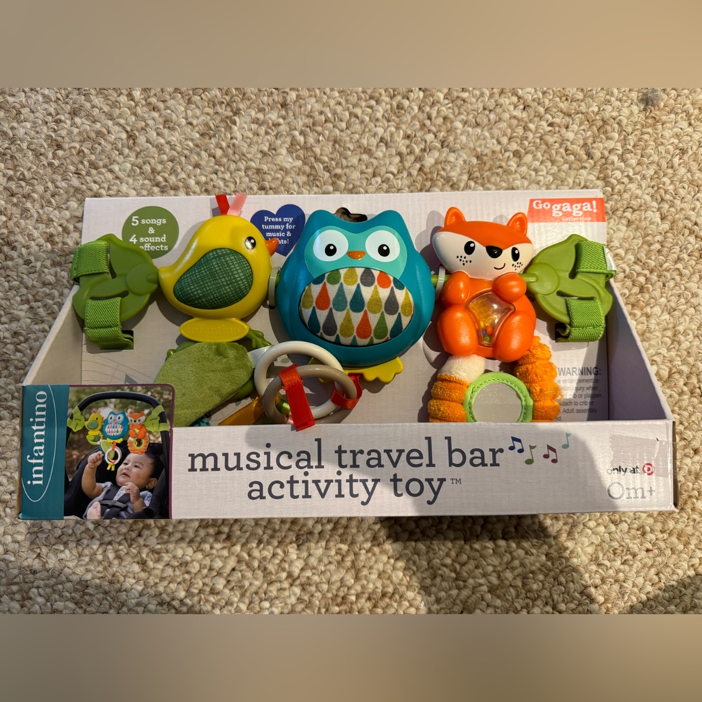 Musical travel bar activity toy